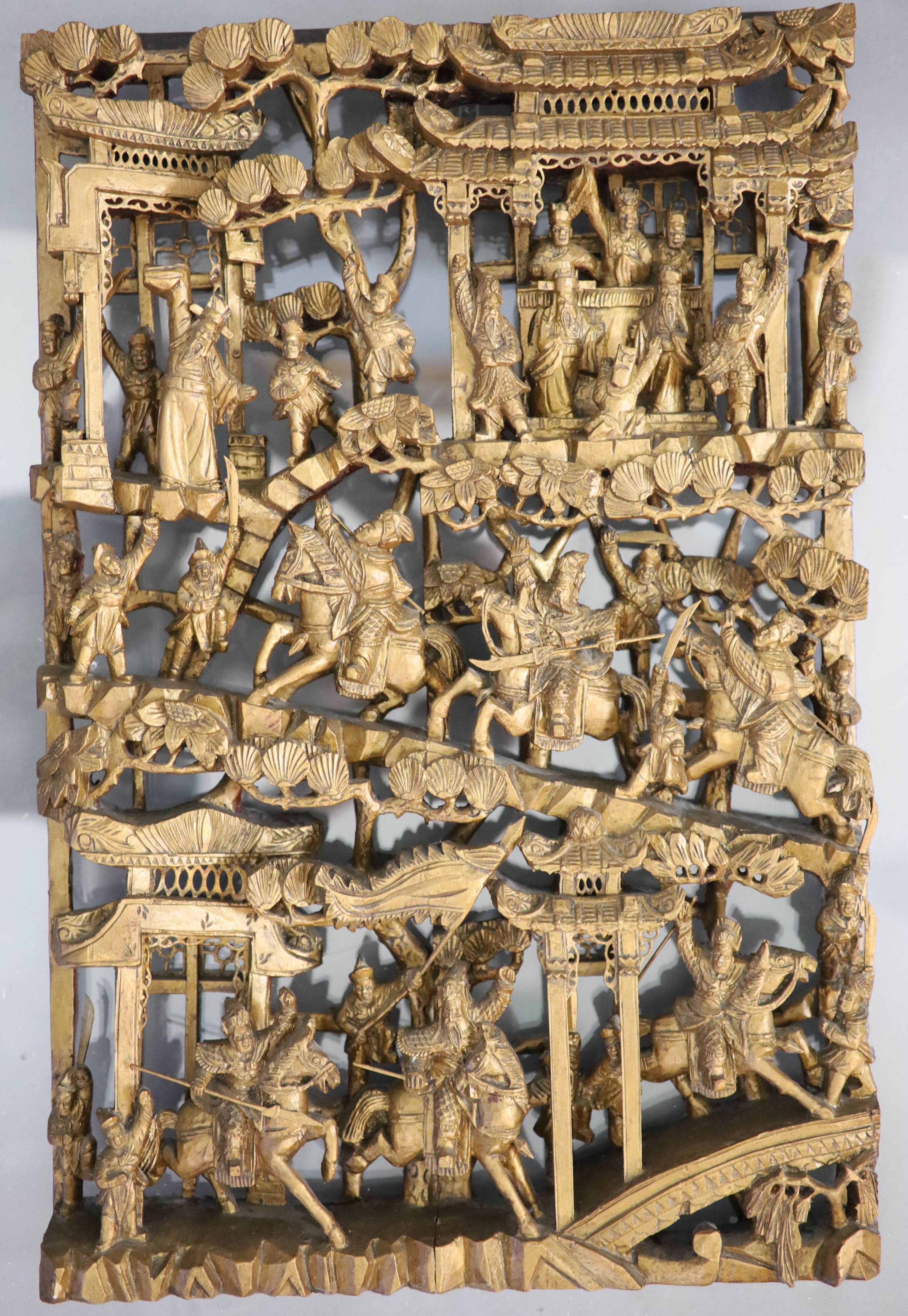 A pair of Chinese giltwood panels, late 19th century 63.5 x 40.5cm excluding Perspex mount